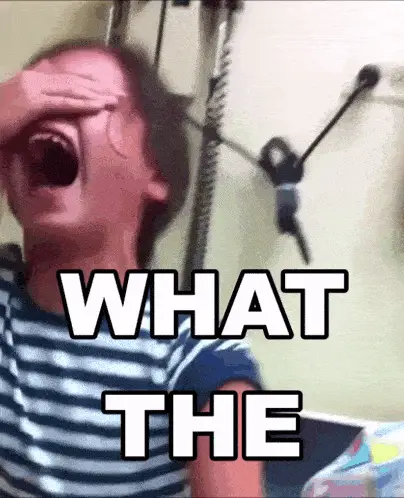 scream-loud-scream - Horror Hating Child in a striped shirt screams with hand on forehead; bold caption reads 'WHAT THE' for a shocked meme reaction.